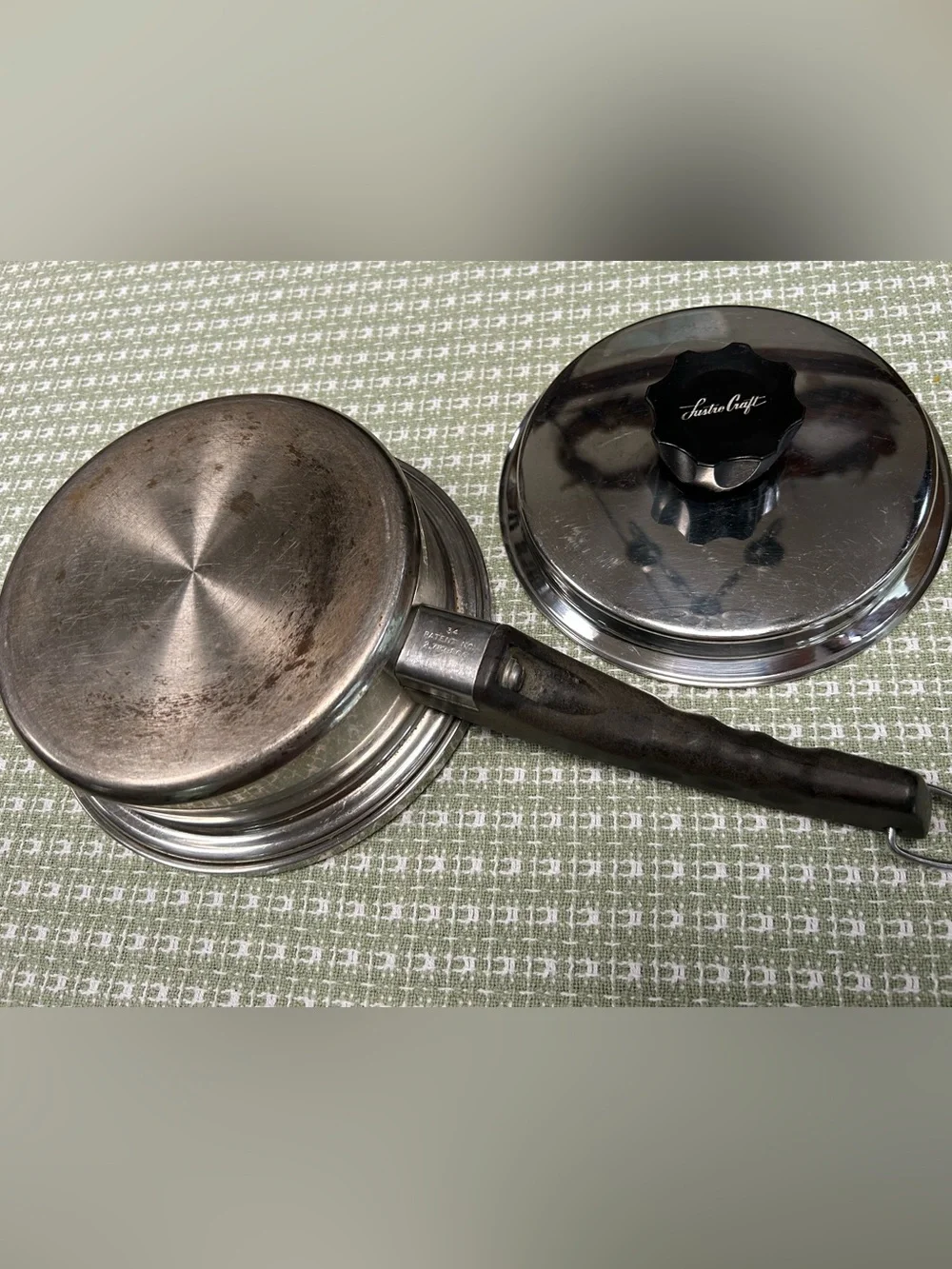 Lustre Craft stainless 7” pan w/fitted lid, black handle w hanging ring. Heavy!